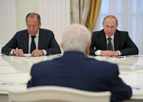 Russian President Vladimir Putin meets with Syrian Foreign Minister Walid Muallem