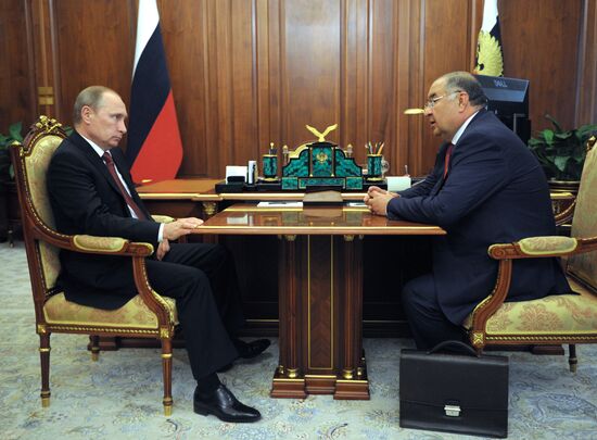 Russian President Vladimir Putin meets with USM Holdings founder Alisher Usmanov