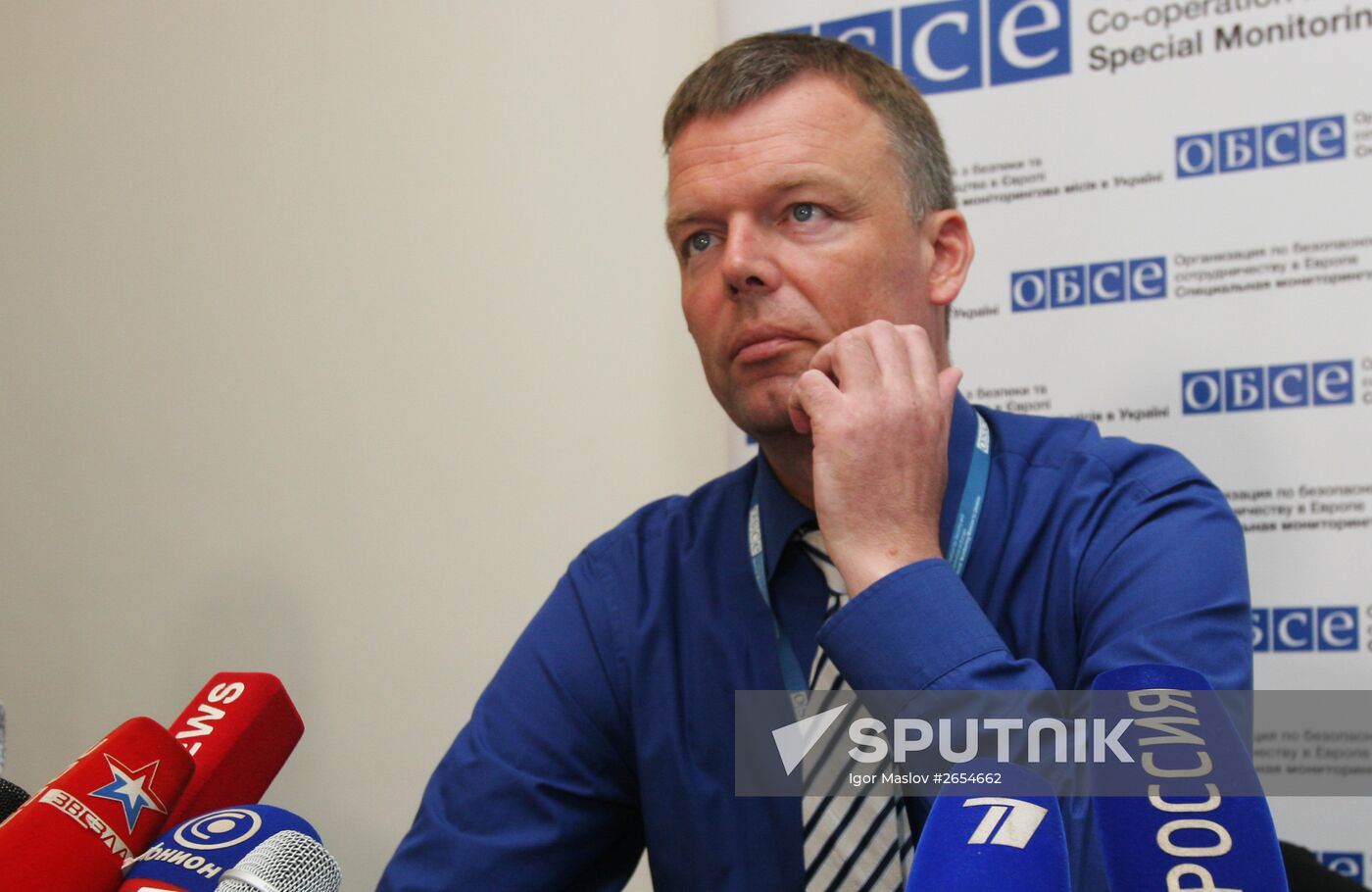 Deputy Chief Monitor of OSCE Special Monitoring Mission to Ukraine Alexander Hug speaks with journalists
