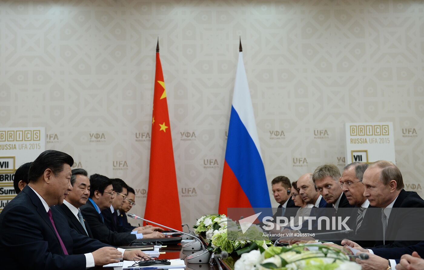 President of the Russian Federation Vladimir Putin meets with President of the People’s Republic of China Xi Jinping