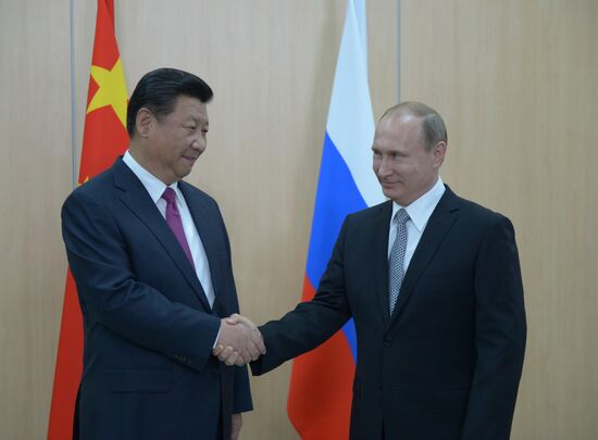 President of the Russian Federation Vladimir Putin meets with President of the People’s Republic of China Xi Jinping