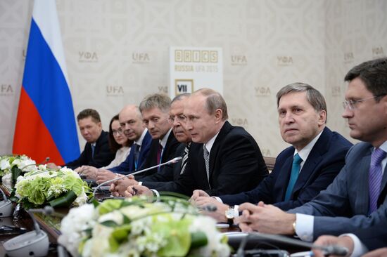 President of Russia Vladimir Putin meets with President of China Xi Jinping