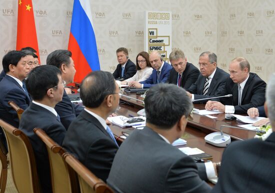 President of the Russian Federation Vladimir Putin meets with President of the People’s Republic of China Xi Jinping