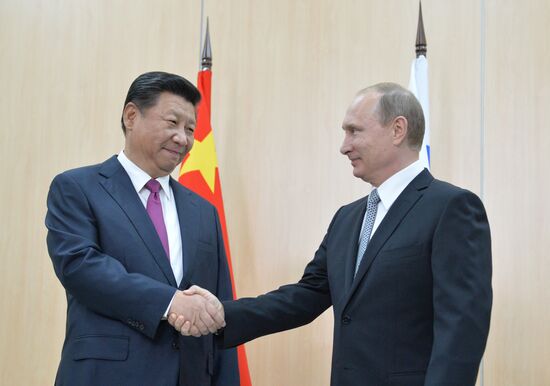 President of Russia Vladimir Putin meets with President of China Xi Jinping
