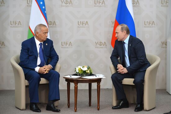 Russian President Vladimir Putin meets with President of Uzbekistan Islam Karimov