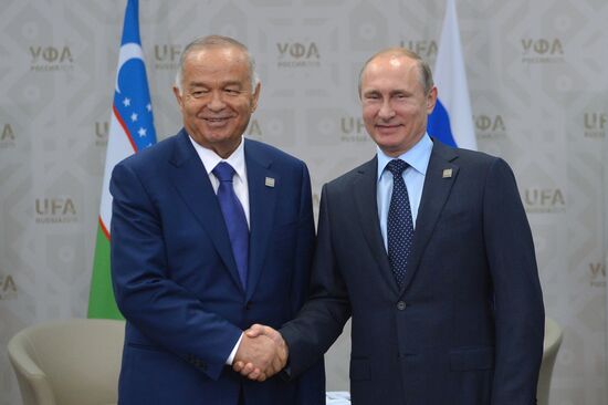 Russian President Vladimir Putin meets with President of Uzbekistan Islam Karimov