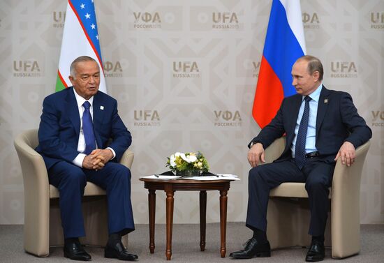 Russian President Vladimir Putin meets with President of Uzbekistan Islam Karimov