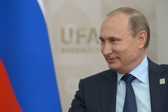 Russian President Vladimir Putin meets with President of Uzbekistan Islam Karimov