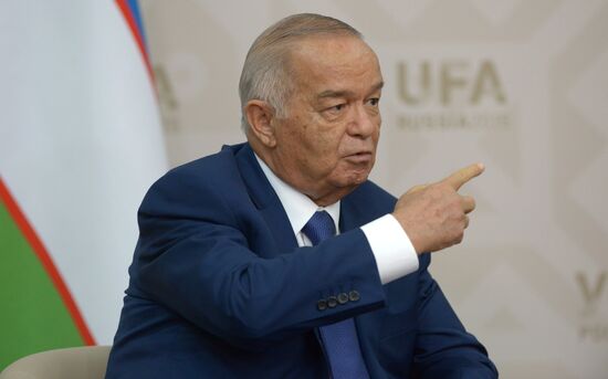 Russian President Vladimir Putin meets with President of Uzbekistan Islam Karimov