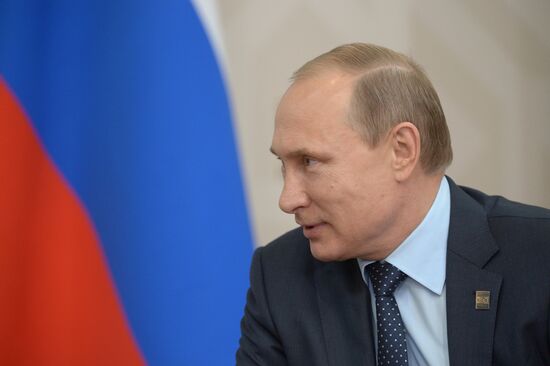 Russian President Vladimir Putin meets with President of Uzbekistan Islam Karimov