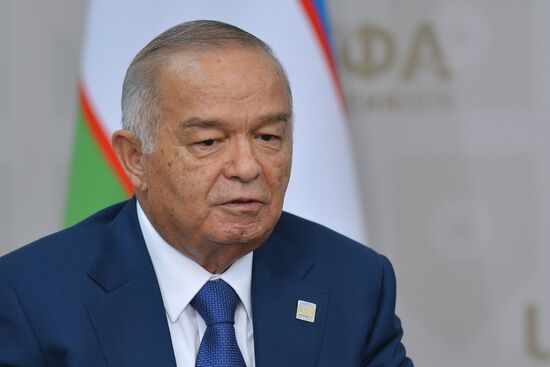 Russian President Vladimir Putin meets with President of Uzbekistan Islam Karimov