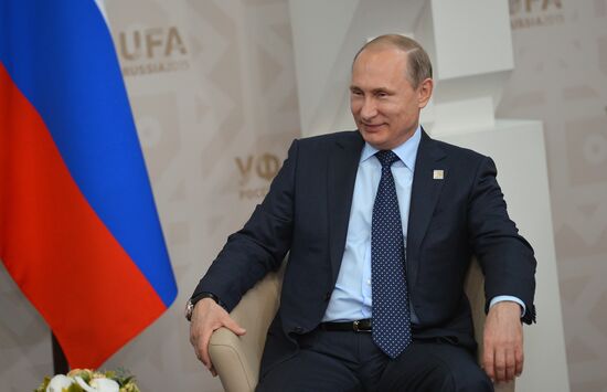 President of the Russian Federation Vladimir Putin meets with President of Uzbekistan Islam Karimov