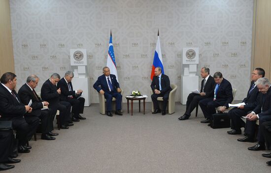 President of the Russian Federation Vladimir Putin meets with President of Uzbekistan Islam Karimov