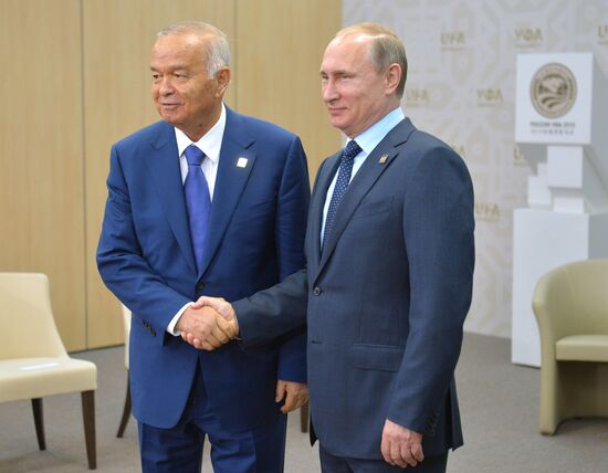 President of the Russian Federation Vladimir Putin meets with President of Uzbekistan Islam Karimov