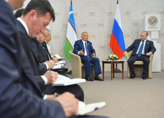 President of the Russian Federation Vladimir Putin meets with President of Uzbekistan Islam Karimov