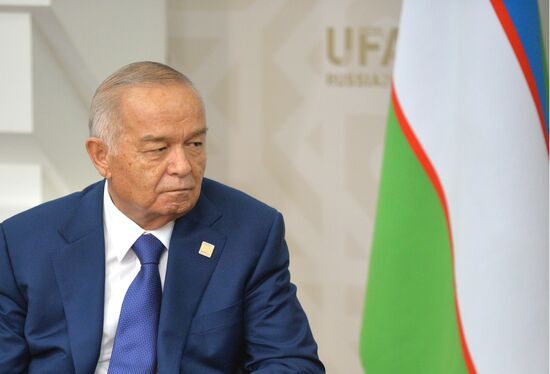 President of the Russian Federation Vladimir Putin meets with President of Uzbekistan Islam Karimov