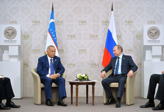 President of the Russian Federation Vladimir Putin meets with President of Uzbekistan Islam Karimov