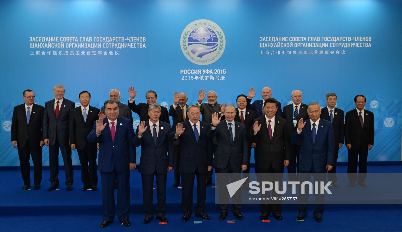 Group photograph of the SCO heads of state, the heads of observer states and governments, and international organisation delegation heads