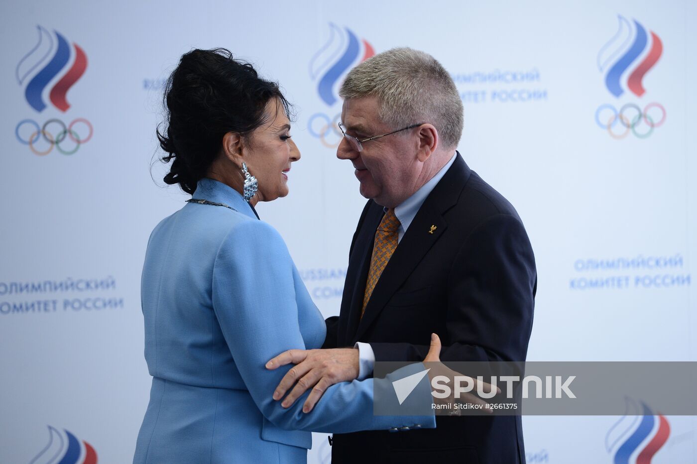 IOC President Thomas Bach presents Olympic Order to RRGF President Irina Viner-Usmanova