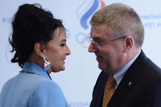 IOC President Thomas Bach presents Olympic Order to RRGF President Irina Viner-Usmanova