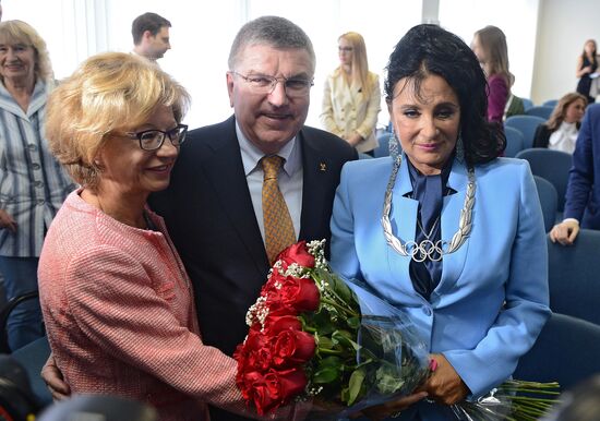 IOC President Thomas Bach presents Olympic Order to RRGF President Irina Viner-Usmanova