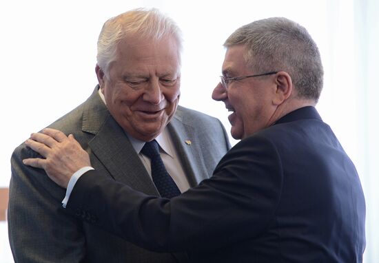 IOC President Thomas Bach presents Olympic Order to RRGF President Irina Viner-Usmanova