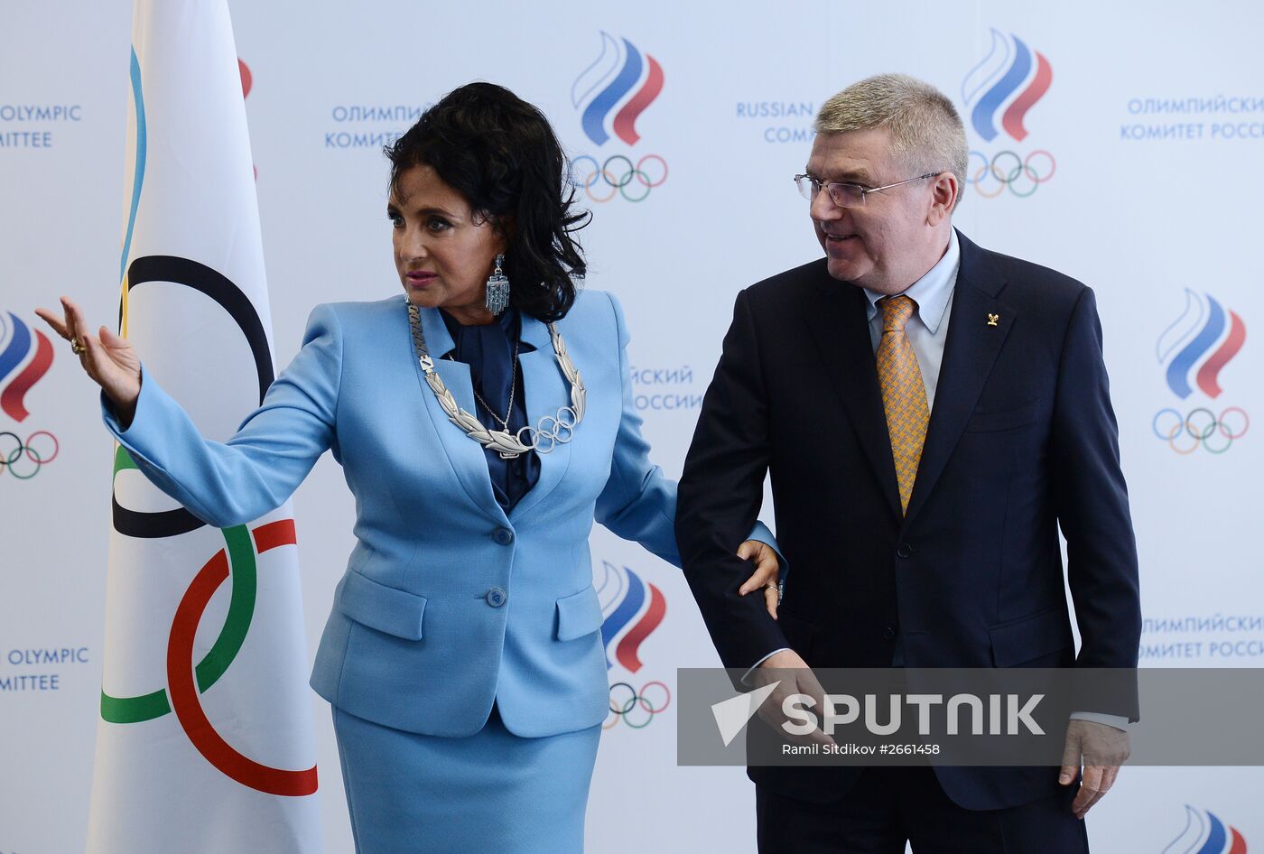 IOC President Thomas Bach presents Olympic Order to RRGF President Irina Viner-Usmanova