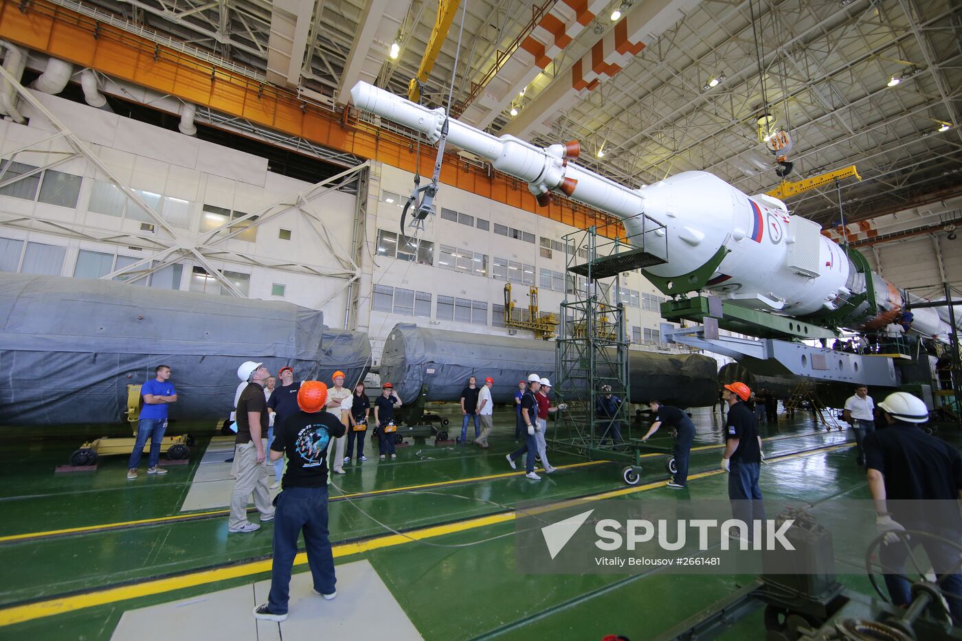 Soyuz TMA-17M spacecraft prepared for rollout to launch pad