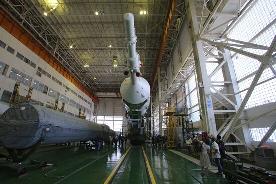 Soyuz TMA-17M spacecraft prepared for rollout to launch pad