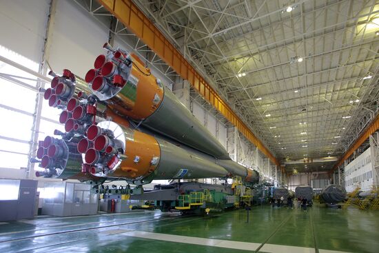 Soyuz TMA-17M spacecraft prepared for rollout to launch pad
