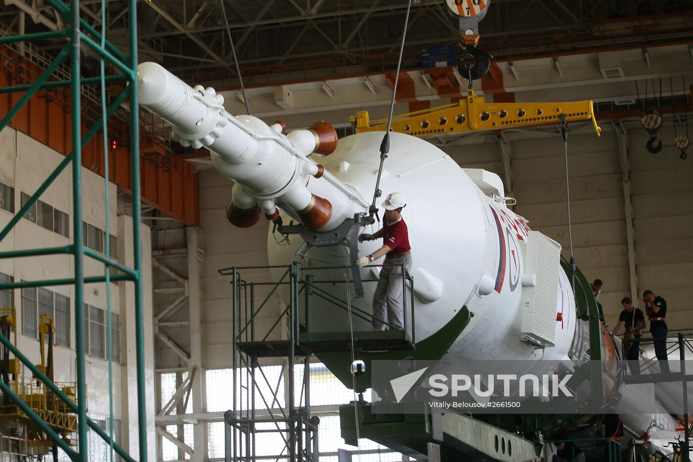 Soyuz TMA-17M spacecraft prepared for rollout to launch pad