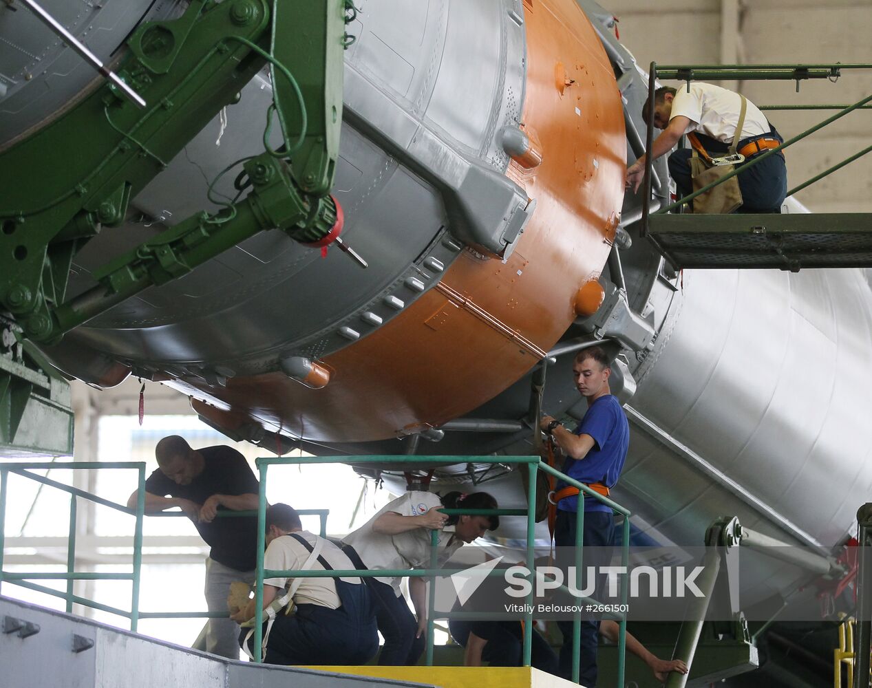 Soyuz TMA-17M spacecraft prepared for rollout to launch pad