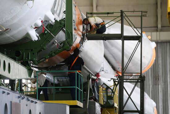 Soyuz TMA-17M spacecraft prepared for rollout to launch pad
