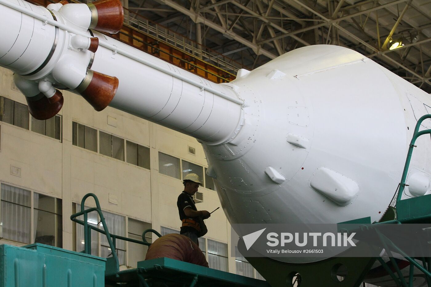 Soyuz TMA-17M spacecraft prepared for rollout to launch pad