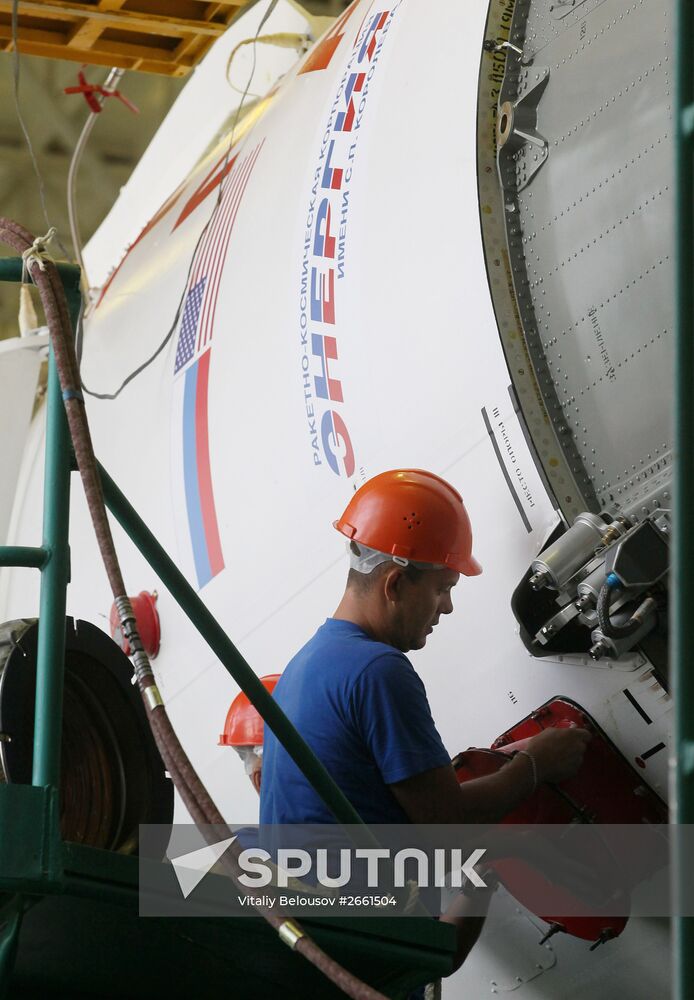 Soyuz TMA-17M spacecraft prepared for rollout to launch pad