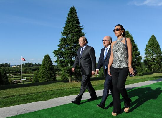 President Vladimir Putin meets with FIFA Presidentt Sepp Blatter