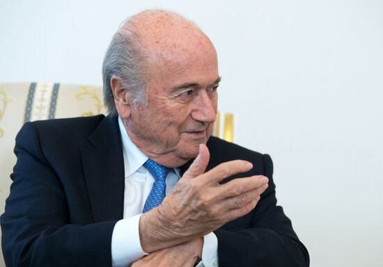 President Vladimir Putin meets with FIFA Presidentt Sepp Blatter