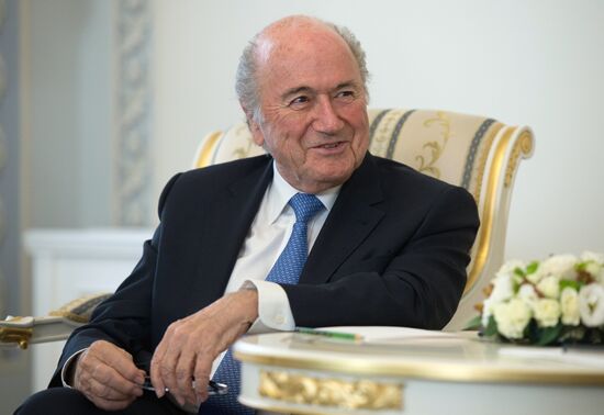 President Vladimir Putin meets with FIFA Presidentt Sepp Blatter