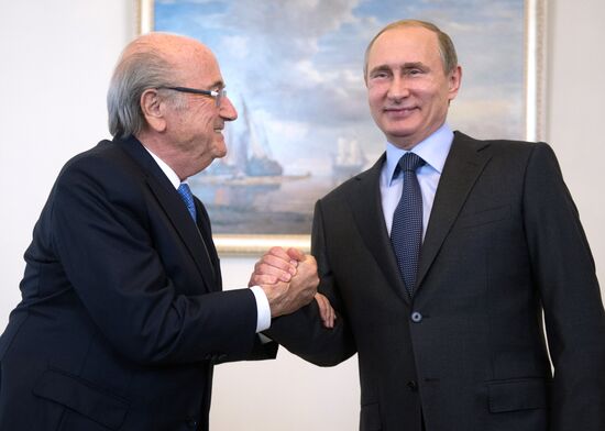 President Vladimir Putin meets with FIFA Presidentt Sepp Blatter