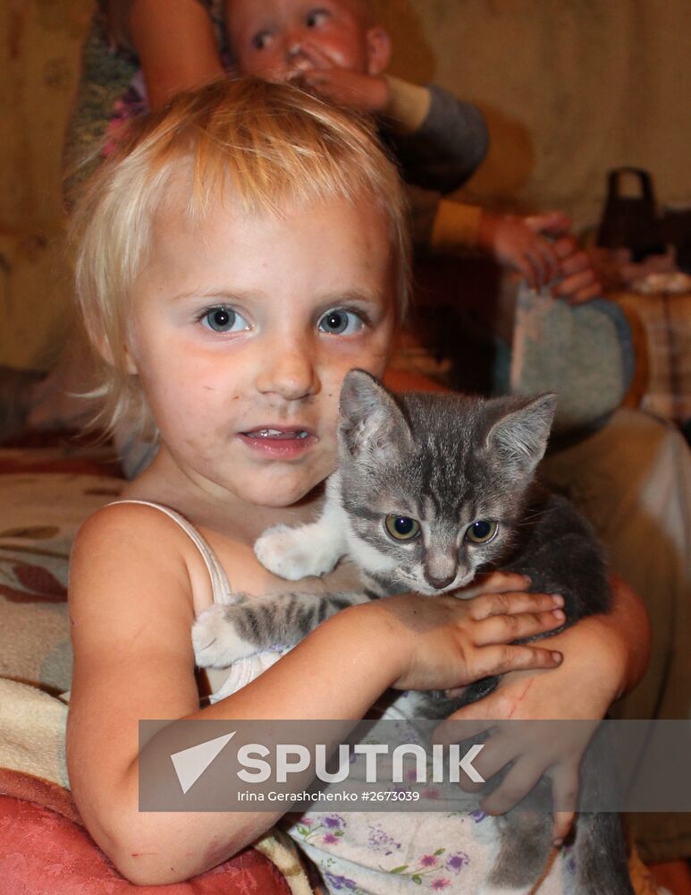 Children at bombproof shelter in Donetsk