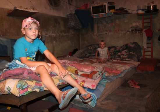 Children at bombproof shelter in Donetsk