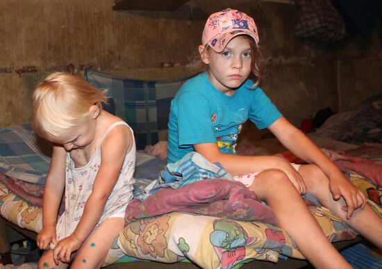Children at bombproof shelter in Donetsk
