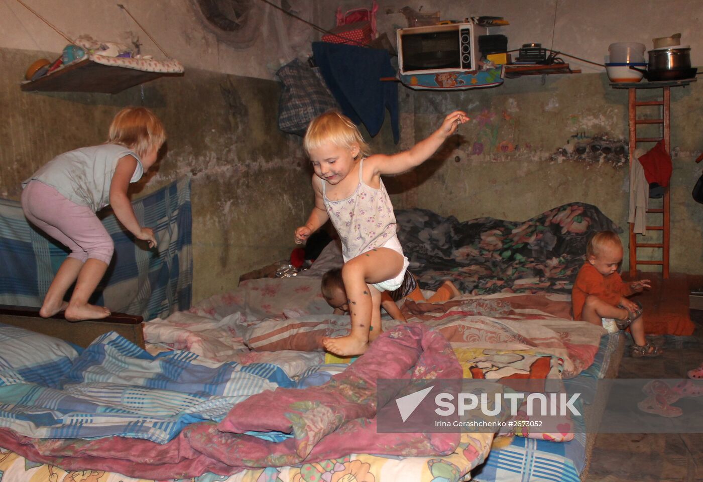 Children at bombproof shelter in Donetsk