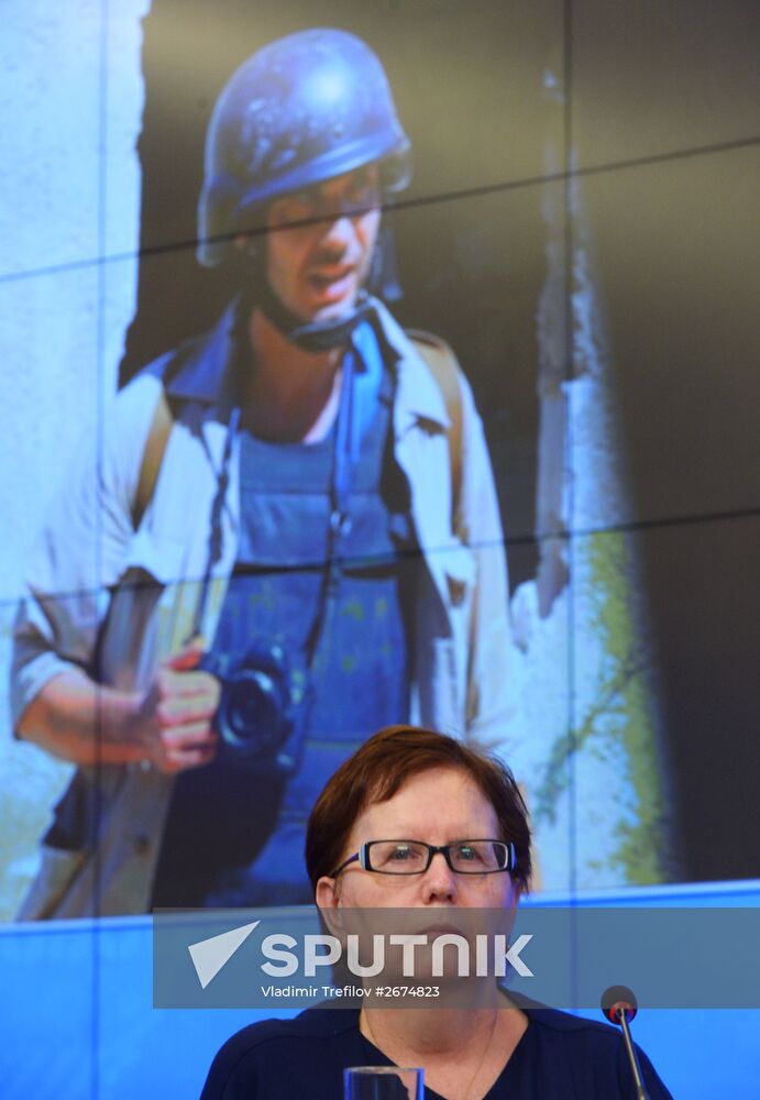 News conference timed to one year's anniversary of death of Andrei Stenin, Rossiya Segodnya photo correspondentA