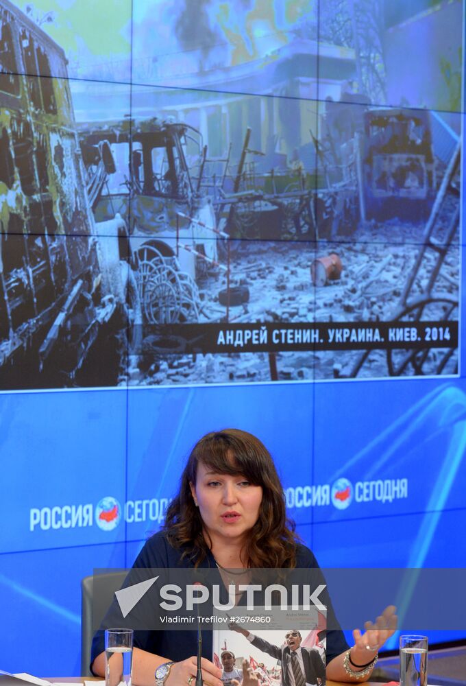 News conference timed to one year's anniversary of death of Andrei Stenin, Rossiya Segodnya photo correspondent