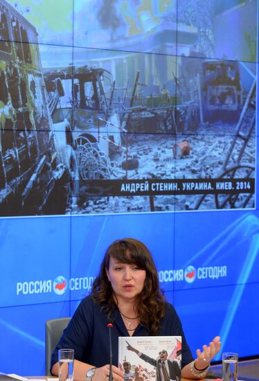 News conference timed to one year's anniversary of death of Andrei Stenin, Rossiya Segodnya photo correspondent