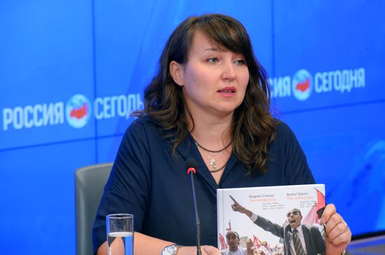 News conference timed to one year's anniversary of death of Andrei Stenin, Rossiya Segodnya photo correspondent