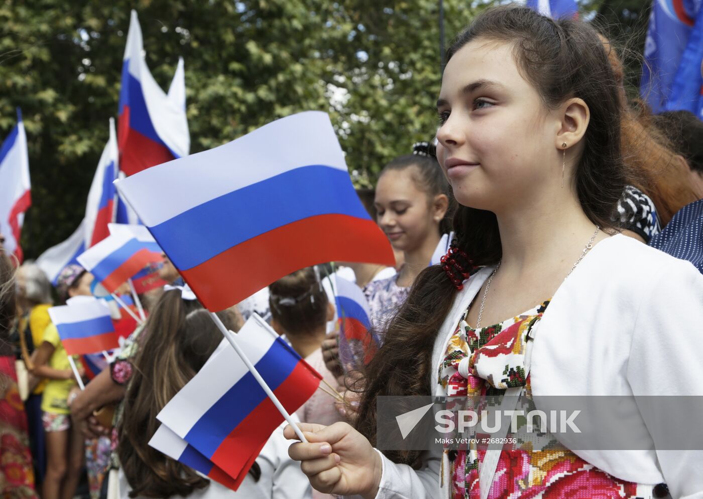 Celebrating Russia's National Flag Day in Russian cities