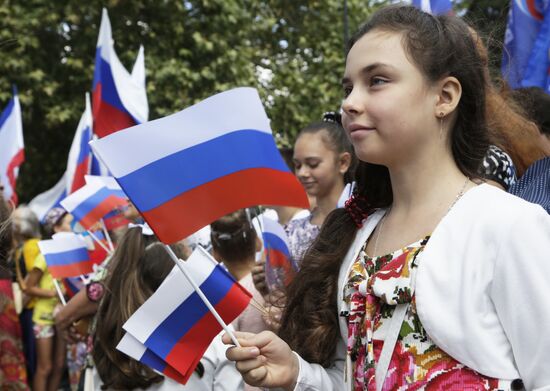 Celebrating Russia's National Flag Day in Russian cities