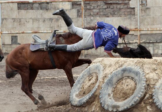 Kyrgyzstan's open championship on kok-boru (horse-mounted players dragging a goat carcass)